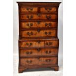 A George III crossbanded walnut chest-on-chest,