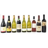 A mixed group of nine bottles of red and white wine,