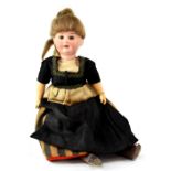 Armand Marseille, Germany: a 19th century bisque head doll with sleepy eyes and open mouth,