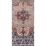 A fine handmade Semnan rug, 192 x 125cm.