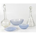 A vintage-style blue glass dessert bowl comprising a large bowl,