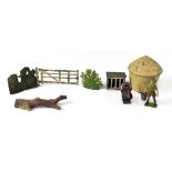 A quantity of early 20th century lead and metal farmyard animals and figures to include cows, sheep,