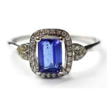 A modern 14ct white gold Tanzanite ring, the central emerald cut stone, clarity VS,