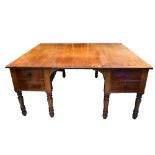 A large Victorian mahogany twin pedestal partners' desk,