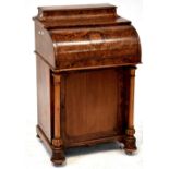 A Victorian burr walnut piano top Davenport, the inlaid top with foliate and floral motifs,