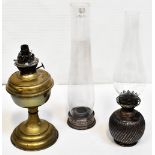 A silver plated oil lamp with ball-shaped reservoir, with a glass funnel,