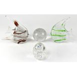 A large group of decorative balls, paperweights, glass fruits,