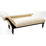 An Edwardian mahogany chaise longue, button back upholstered in a woven cream fabric,