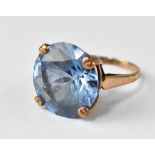 A 9ct yellow gold ladies' dress ring set with blue faceted stone, tests as tourmaline, size K,