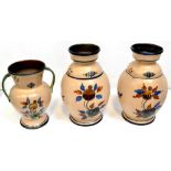 Three early/mid-20th century Swedish pottery vases comprising a pair of globular vases,