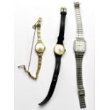 Polaris; a ladies' vintage 14kt gold watch, the silvered dial set with baton numerals,