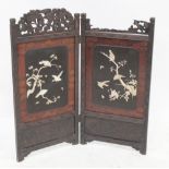 A Chinese two-panel carved hardwood fire screen, each inset with Shibayama panels of birds in trees,