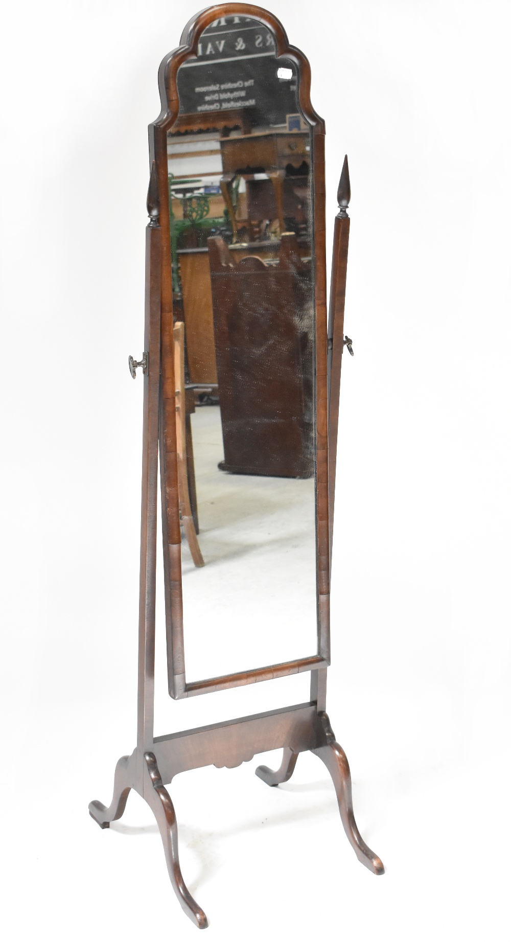 A Georgian-style mahogany cheval mirror with an arched top, on square supports with outswept legs,