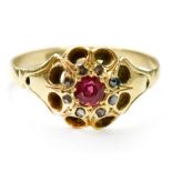 An 18ct gold ruby and diamond flower cluster ring,