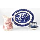 A quantity of mainly blue and white tea and dinner ware to include Willow pattern,