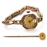 A ladies' vintage 9ct gold wristwatch with crown wound movement, the dial set with Roman numerals,