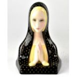 Lenci; an Art Deco figure depicting Madonna with hands clasped, by Paola Bologna,