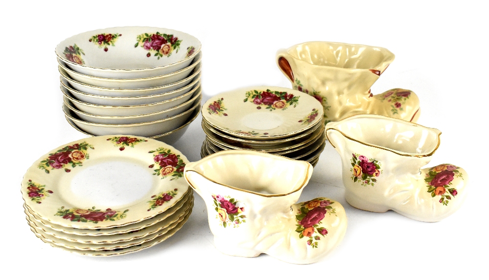 A quantity of Royal Norfolk tableware decorated with roses including dinner plates, bowls, cups,