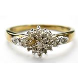 A modern 9ct gold diamond cluster ring, the head of marquise shape filled with tiny diamonds,