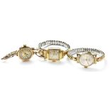 Three vintage ladies' wristwatches to include a 9ct gold example with white chapter ring and black