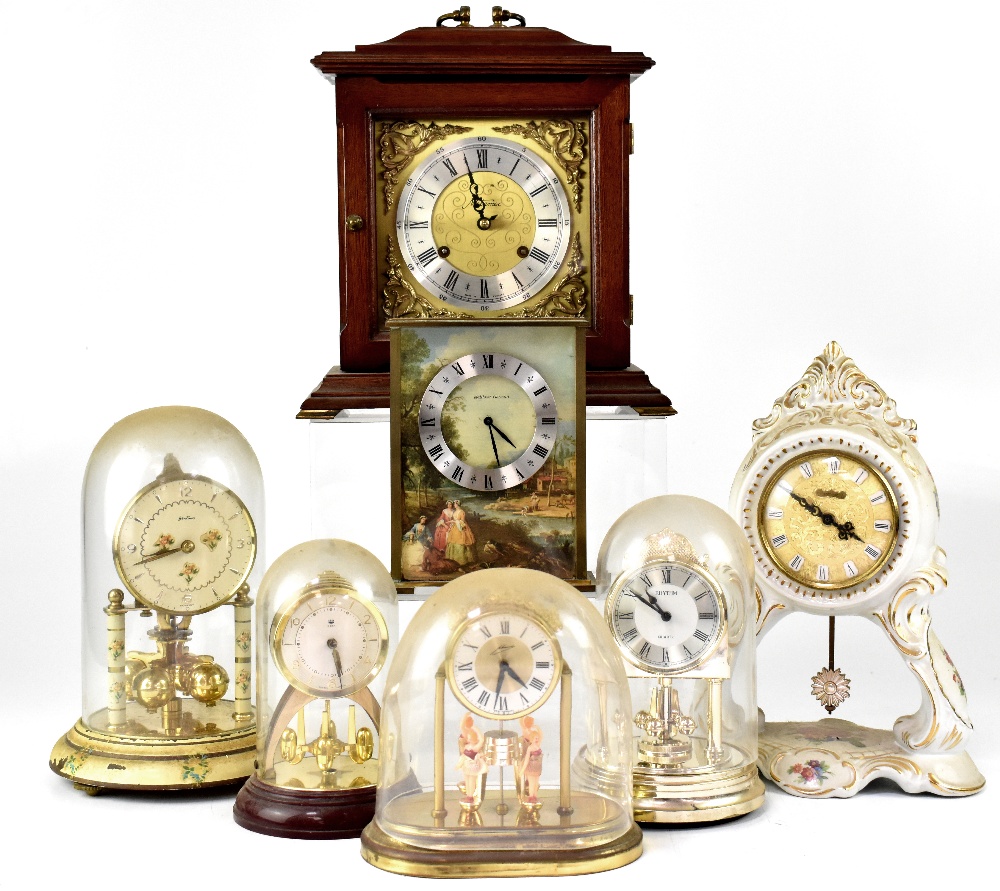 A group of various clocks to include a Metamec mahogany cased mantel clock,