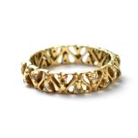 A vintage 14ct gold and diamond eternity ring,