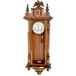 An early 20th century Vienna-style mahogany cased eight-day wall clock,