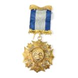 An Elizabeth II hallmarked silver gilt Masonic medal for Middleton Lodge, Louis Simpson & Co,