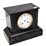 A Victorian slate mantel clock, the painted dial set with Roman numerals,