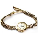 Chateau; a ladies' vintage 9ct gold wristwatch, the white dial set with Arabic numerals,