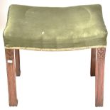 A 19th century mahogany stool, upholstered in a green fabric, with studded brocade,