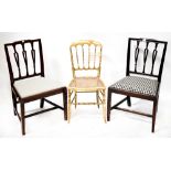 A set of six 18th century ladder back rush seated chairs with four rails,