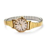 Omega; a ladies' 9ct gold vintage Omega wristwatch, the silvered dial set with baton numerals,