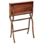 A 19th century mahogany folding coaching table (locked, lacking key),