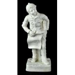 A late 19th/early 20th century Robinson & Leadbetter Parian ware figure of an Edwardian newspaper