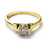 A 18ct gold diamond solitaire ring, the single brilliant approx 0.