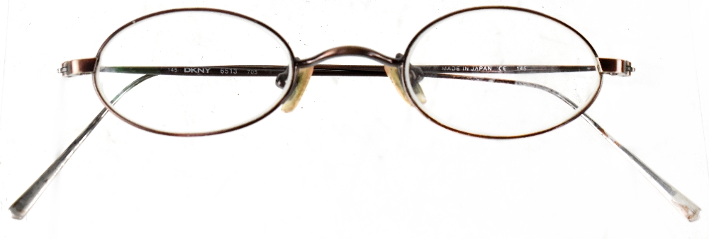 Julia Baird; a pair of DKNY reading glasses, donated by Julia Baird the sister of John Lennon.