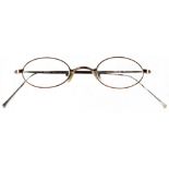 Julia Baird; a pair of DKNY reading glasses, donated by Julia Baird the sister of John Lennon.