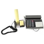 A Bang & Olufsen Beocom 2000 telephone with instruction manual and one other Beocom telephone (2).