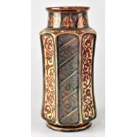 A 19th century Hispano Moorish tin glaze lustre ware case of hexagonal form with alternating panels