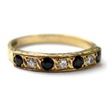 A 9ct gold diamond and sapphire half eternity ring,