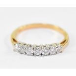 An 18ct yellow gold seven stone diamond ring, approx diamond total 0.5ct.