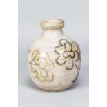 REGINALD MARLOW; a stoneware bottle with iron and copper floral decoration on mottled pale grey