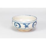 URSULA MOMMENS (1908-2010); a stoneware footed bowl with cobalt decoration on mottled pale grey