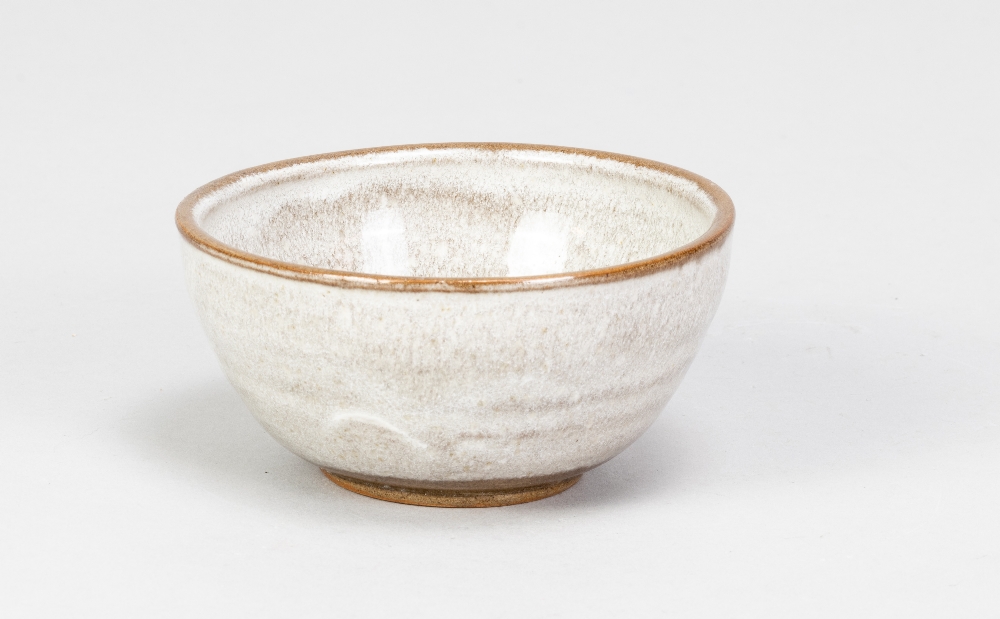 STEPHANIE KALAN (1909-1978); a small stoneware bowl covered in grey glaze, incised signature,