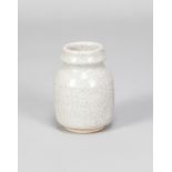 CONSTANCE DUNN; a small stoneware vase covered in white crackle glaze, impressed W mark, made