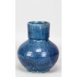 REGINALD FAIRFAX WELLS (1877-1951); a stoneware vase covered in streaky dark blue glaze, incised