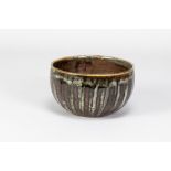 URSULA MOMMENS (1908-2010); a stoneware bowl with striped decoration, impressed UD mark (partially