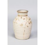 HENRY HAMMOND (1914-1989); a stoneware bottle with iron floral decoration, impressed HH mark, made