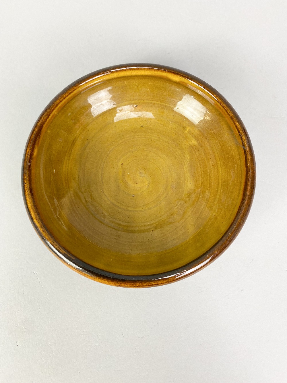 MARGARET LEACH for Taena Pottery; a small shallow slipware bowl, impressed pottery mark, made - Image 3 of 5